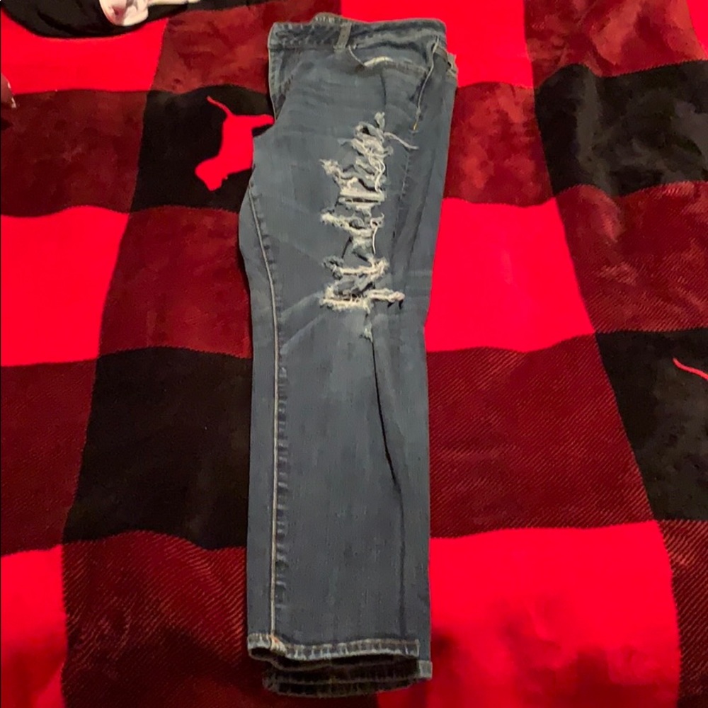 Dark blue ripped jeans